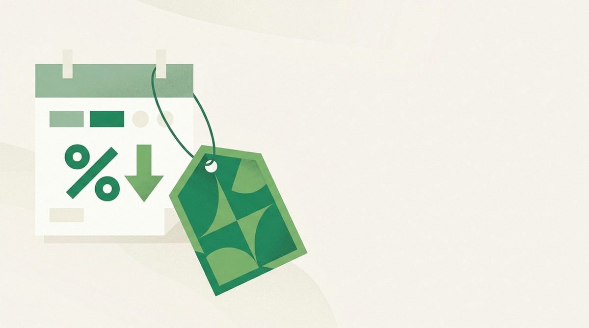 shield price tag with discount percentage hanging from a calendar page