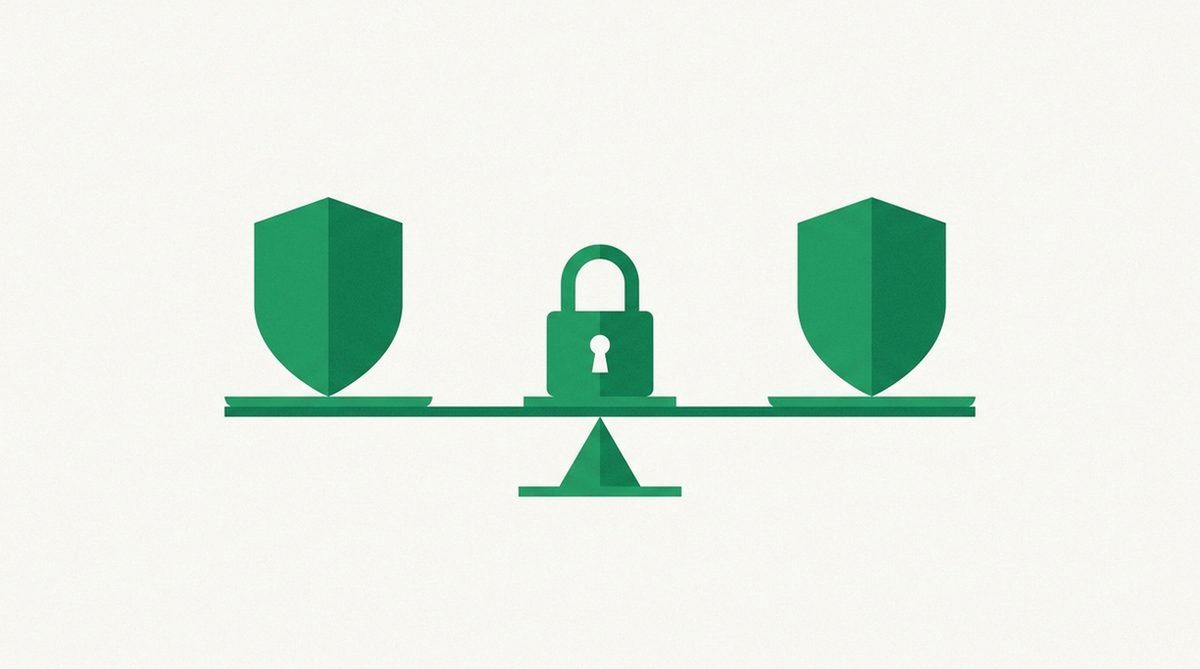 two shields balanced on a scale around a central padlock